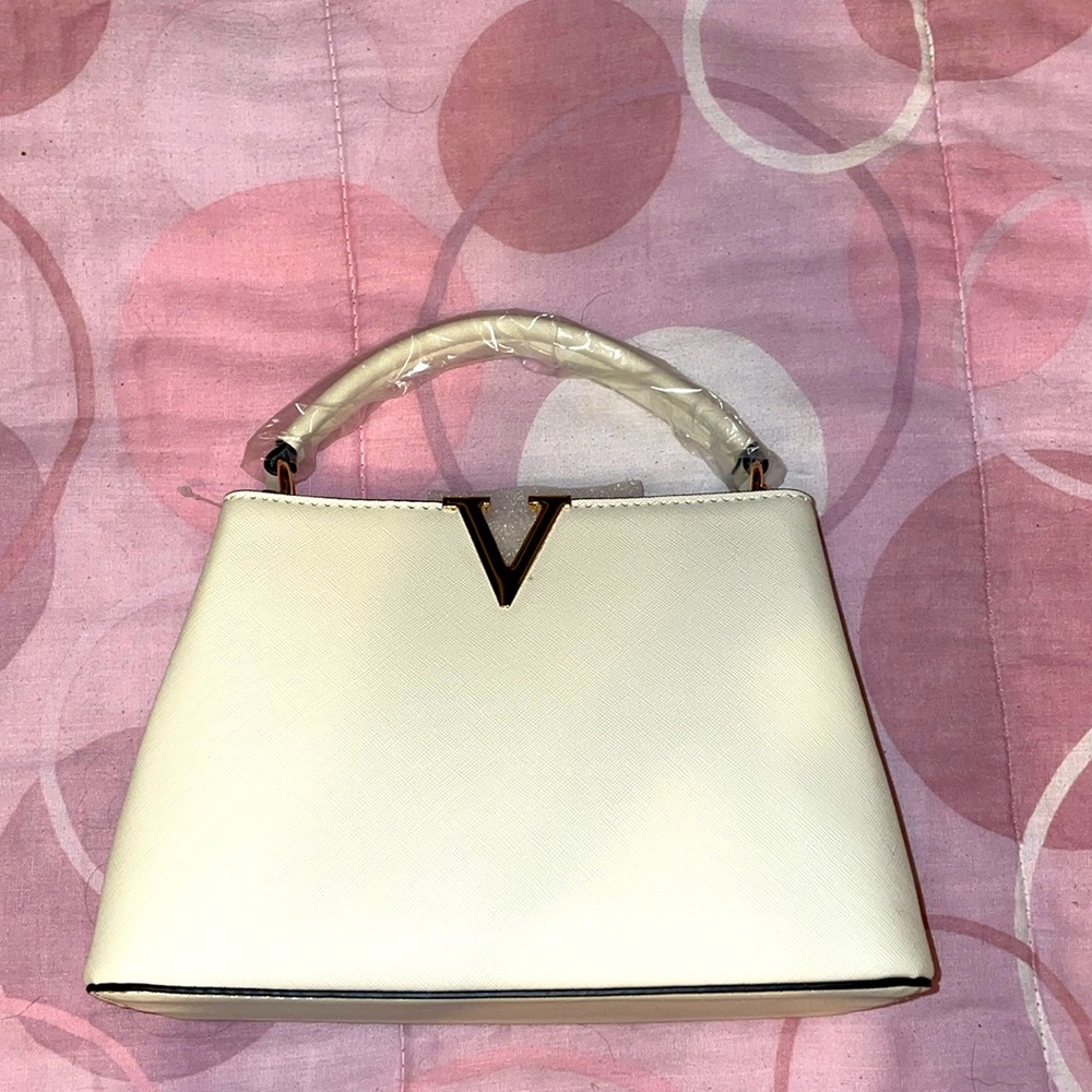 Brand new cream purse
